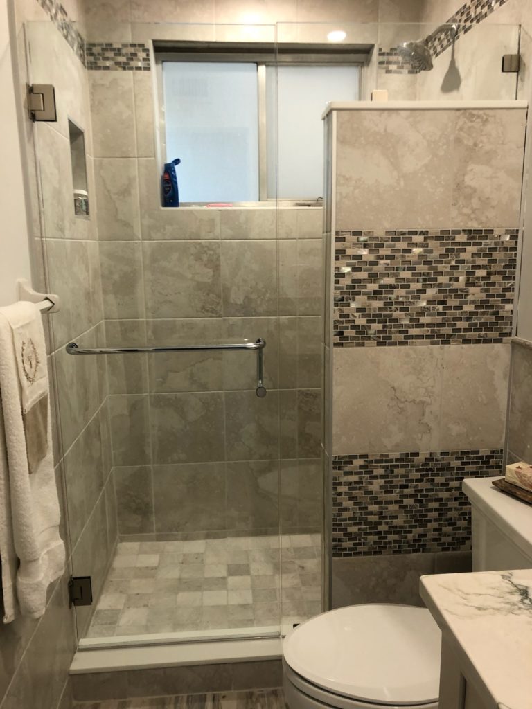 Frameless Inline Shower Door with Notched Panel AQUA Shower Doors